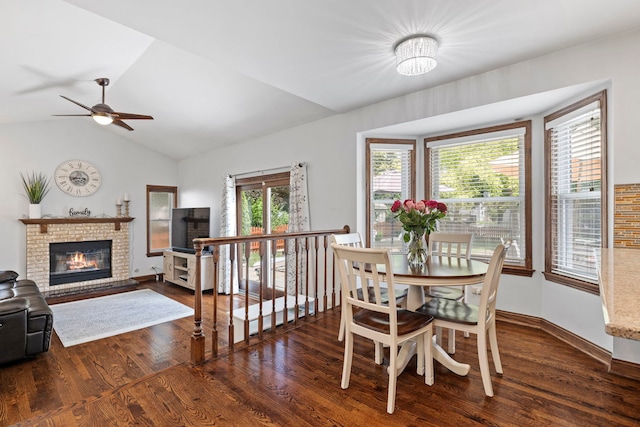 1267 Churchill Rd, Bartlett, IL 60103 - dining room featuring a fireplace, wood finished floors, a ceiling fan, and lofted ceiling