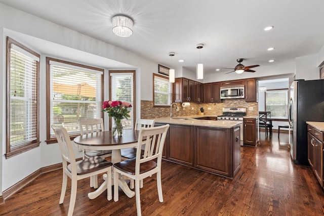 1267 Churchill Rd, Bartlett, IL 60103 - dining room with dark wood finished floors, a ceiling fan, and recessed lighting