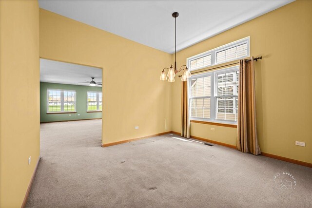 21600 W Larch Dr, Plainfield, IL 60544 - unfurnished room with baseboards, visible vents, carpet, and ceiling fan with notable chandelier