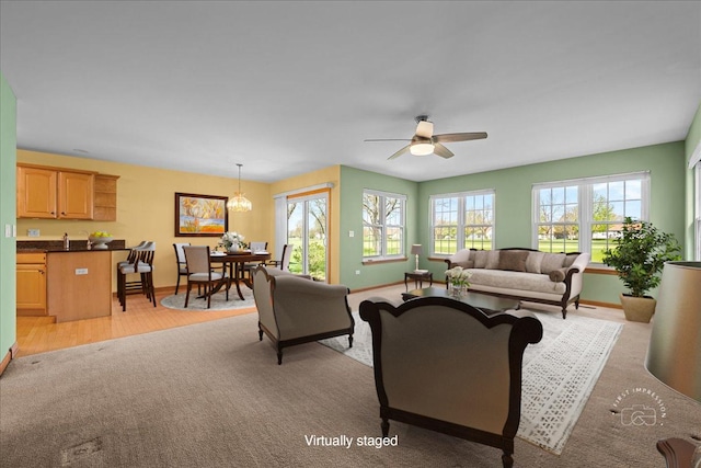 21600 W Larch Dr, Plainfield, IL 60544 - living area with plenty of natural light, baseboards, and ceiling fan