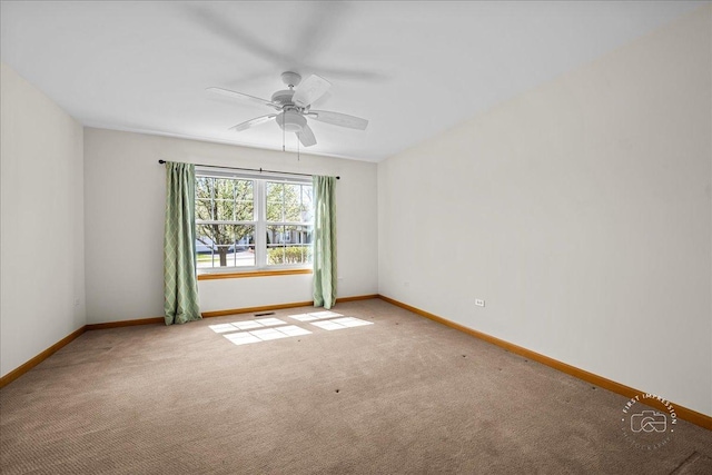 21600 W Larch Dr, Plainfield, IL 60544 - carpeted spare room with baseboards and a ceiling fan