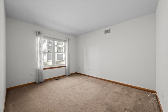 21600 W Larch Dr, Plainfield, IL 60544 - carpeted empty room featuring baseboards and visible vents