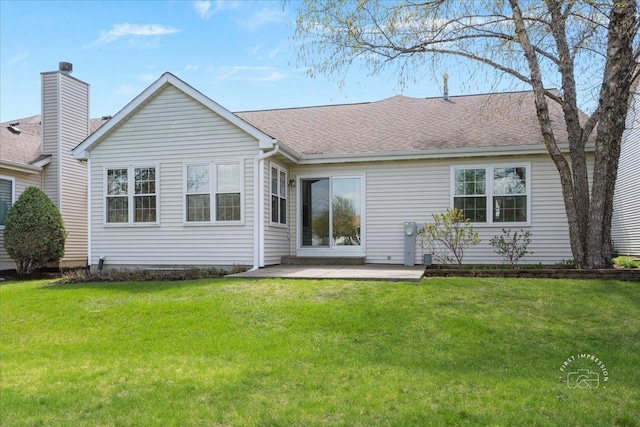 21600 W Larch Dr, Plainfield, IL 60544 - back of house with a lawn, a patio, and a shingled roof