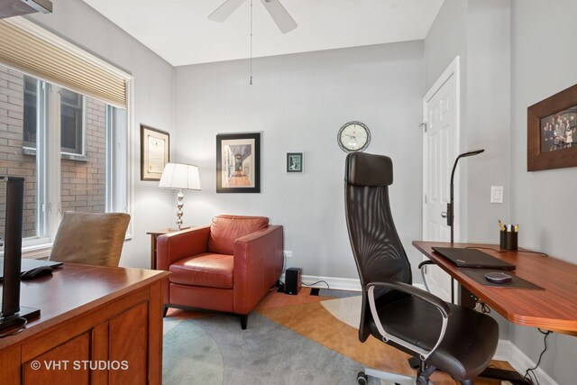 1935 Sherman Ave Unit 2N, Evanston, IL 60201 - home office with ceiling fan, light colored carpet, and baseboards