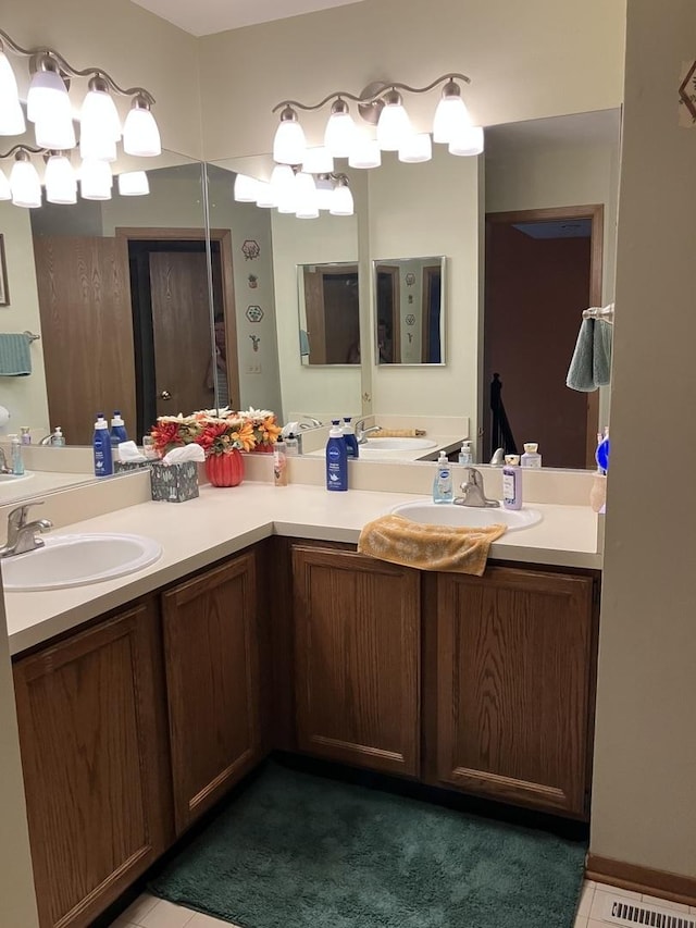 1032 Rockport Dr Unit 1032, Carol Stream, IL 60188 - full bath featuring a sink, double vanity, visible vents, and tile patterned floors