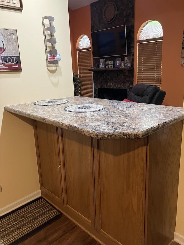 1032 Rockport Dr Unit 1032, Carol Stream, IL 60188 - bar area featuring dark wood-style floors and a fireplace