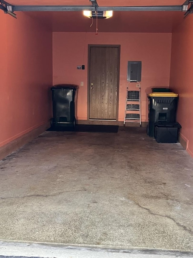 1032 Rockport Dr Unit 1032, Carol Stream, IL 60188 - unfurnished living room with a wood stove, electric panel, and a garage