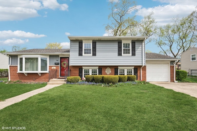 tri-level home featuring a front yard, roof with shingles, brick siding, concrete driveway, and an attached garage