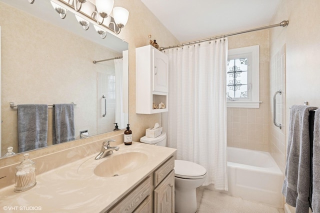 full bathroom featuring toilet, shower / bath combo, and vanity
