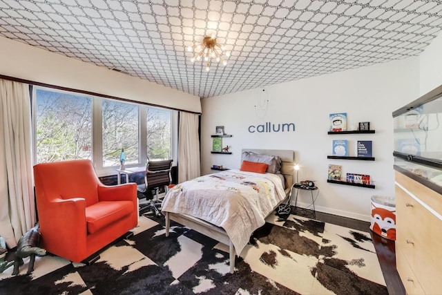 bedroom featuring baseboards