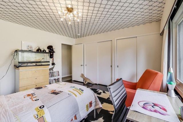 bedroom with two closets