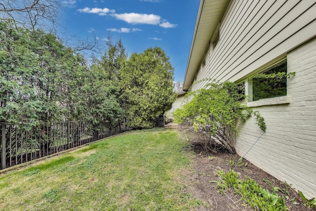 view of yard with fence