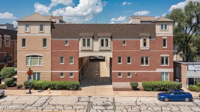 view of building exterior with a carport