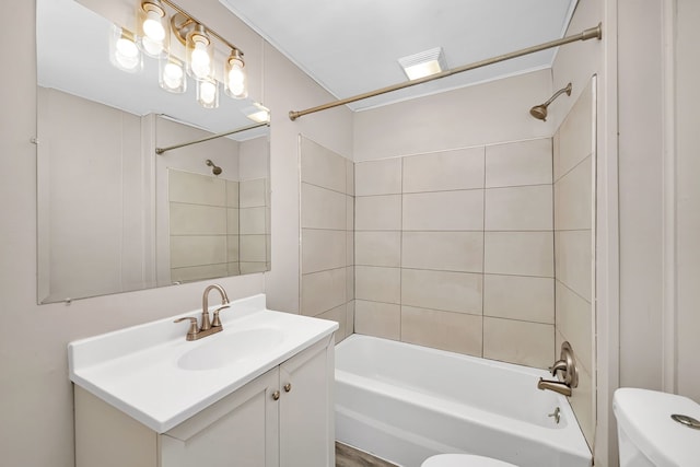 bathroom with vanity, toilet, and bathtub / shower combination