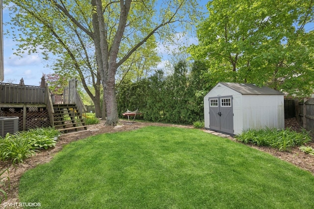 310 N Lytle Dr, Palatine, IL 60074 - view of yard with stairs, a storage shed, an outbuilding, a deck, and central AC