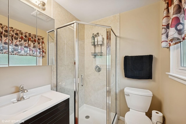 310 N Lytle Dr, Palatine, IL 60074 - full bathroom featuring a shower stall, toilet, and vanity