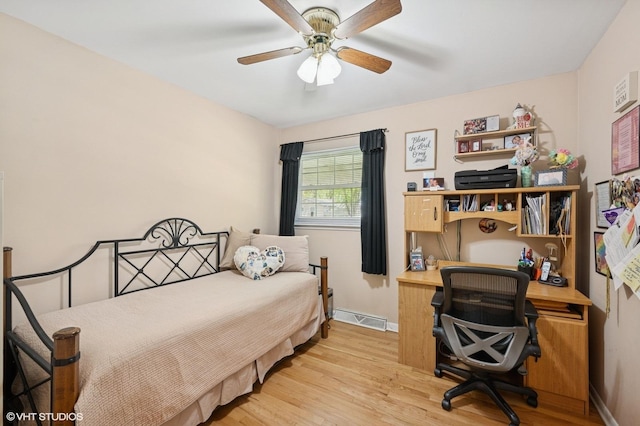 310 N Lytle Dr, Palatine, IL 60074 - bedroom featuring an office area, wood finished floors, baseboards, and ceiling fan