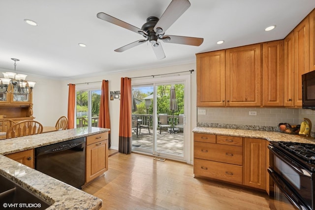 310 N Lytle Dr, Palatine, IL 60074 - kitchen featuring black appliances, ornamental molding, light stone countertops, a chandelier, and light wood-style flooring