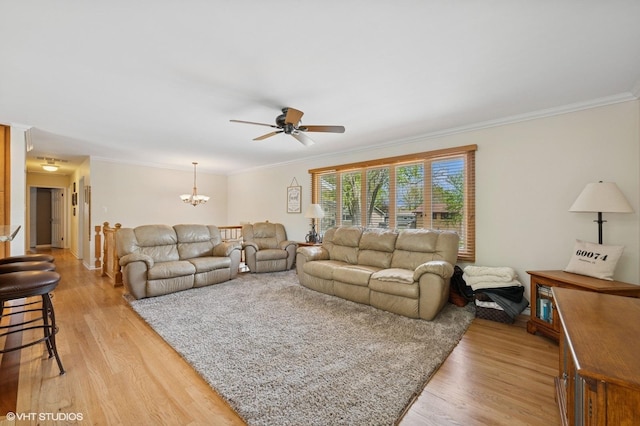 310 N Lytle Dr, Palatine, IL 60074 - living room with light wood-type flooring, a chandelier, ceiling fan, and ornamental molding