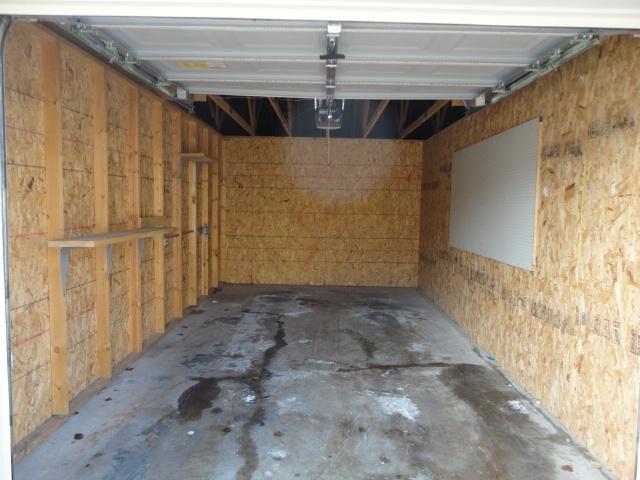 1524 W Sand Bar Ct Unit 2A, Round Lake, IL 60073 - garage with a garage door opener