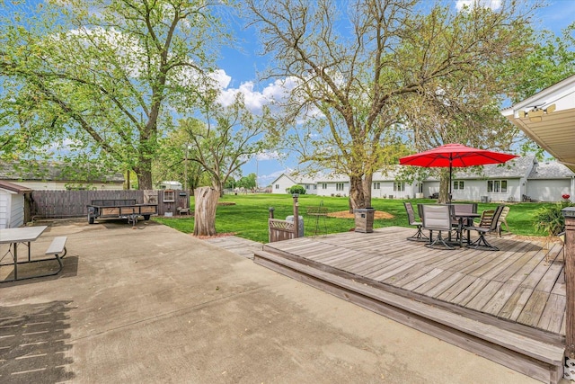 view of patio / terrace with outdoor dining area and a deck
