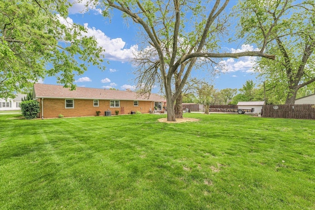 view of yard featuring fence