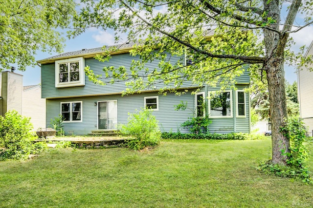 2860 Bridgeport Ln, Aurora, IL 60504 - back of property featuring a lawn