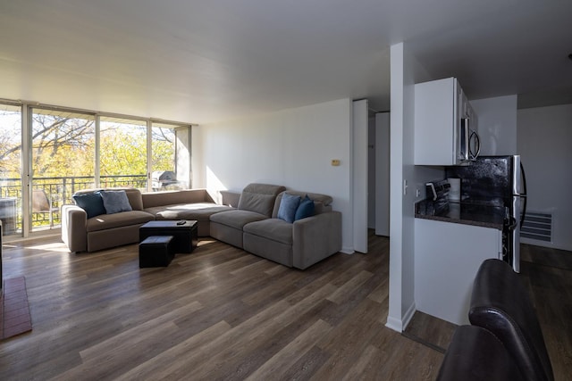 living room with dark wood-style flooring