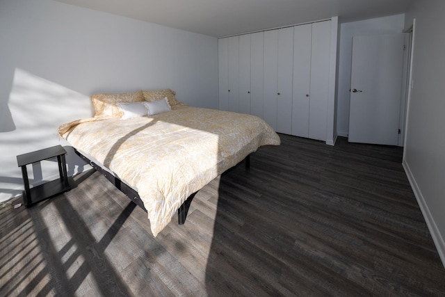 bedroom featuring wood finished floors