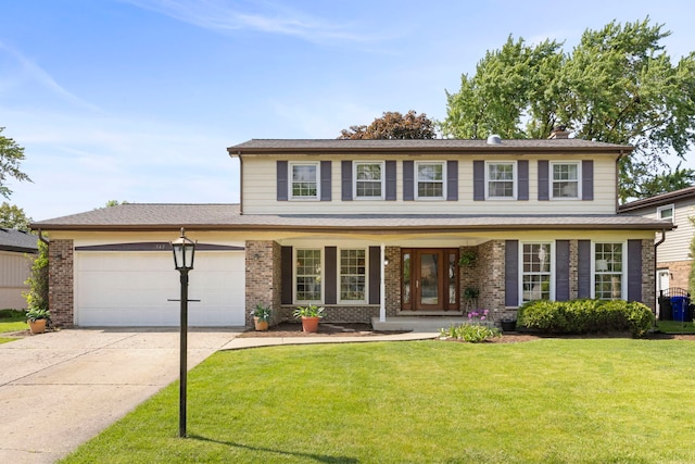 542 Stafford Ln, Glen Ellyn, IL 60137 - view of front of house featuring a garage, driveway, a porch, a front yard, and brick siding