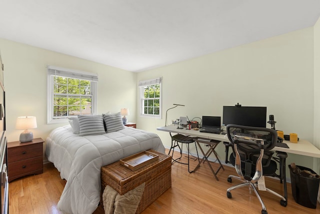 542 Stafford Ln, Glen Ellyn, IL 60137 - bedroom with light wood-style floors and an office area