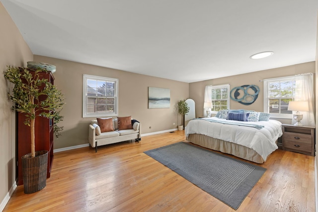 542 Stafford Ln, Glen Ellyn, IL 60137 - bedroom with light wood-style flooring and baseboards