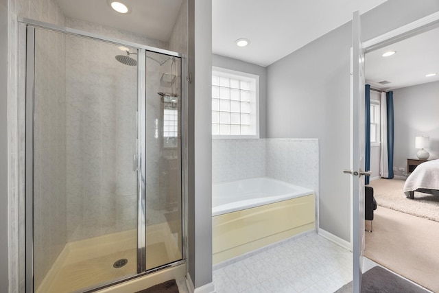ensuite bathroom with a bath, tile patterned flooring, a shower stall, connected bathroom, and recessed lighting