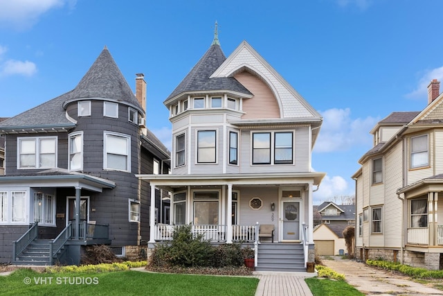 309 Wesley Ave, Oak Park, IL 60302 - victorian-style house with a porch and an outdoor structure