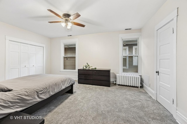 309 Wesley Ave, Oak Park, IL 60302 - bedroom with carpet floors, a closet, radiator heating unit, baseboards, and a ceiling fan