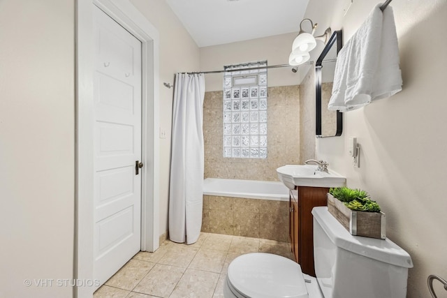 309 Wesley Ave, Oak Park, IL 60302 - bathroom featuring tiled shower / bath combo, toilet, tile patterned flooring, and vanity