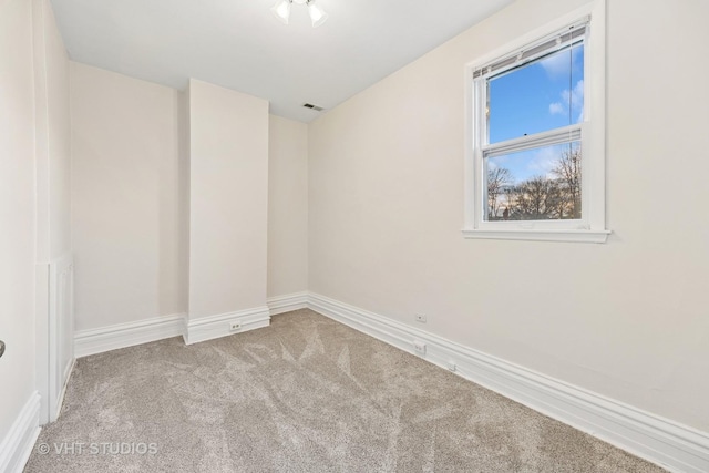 309 Wesley Ave, Oak Park, IL 60302 - unfurnished room with baseboards, visible vents, and carpet flooring
