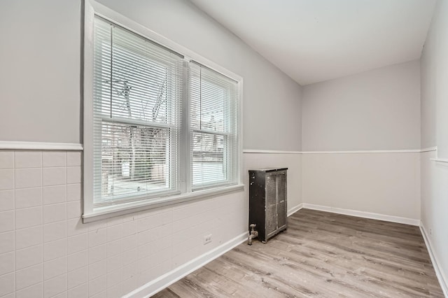 room details featuring wood finished floors and baseboards