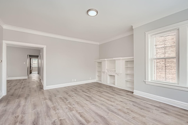 unfurnished living room featuring ornamental molding, a healthy amount of sunlight, and light wood-style flooring