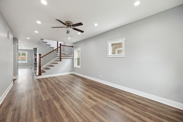 3141 Harvey Ave, Berwyn, IL 60402 - unfurnished living room featuring a ceiling fan, visible vents, stairway, dark wood-style floors, and recessed lighting