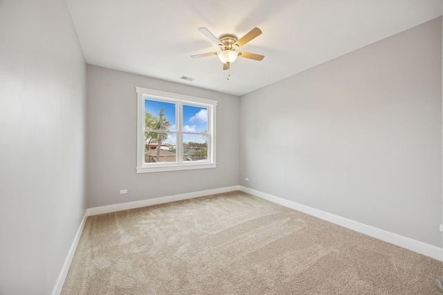 3141 Harvey Ave, Berwyn, IL 60402 - empty room with carpet flooring, a ceiling fan, baseboards, and visible vents