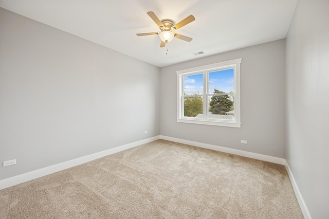 3141 Harvey Ave, Berwyn, IL 60402 - carpeted empty room with baseboards, ceiling fan, and visible vents