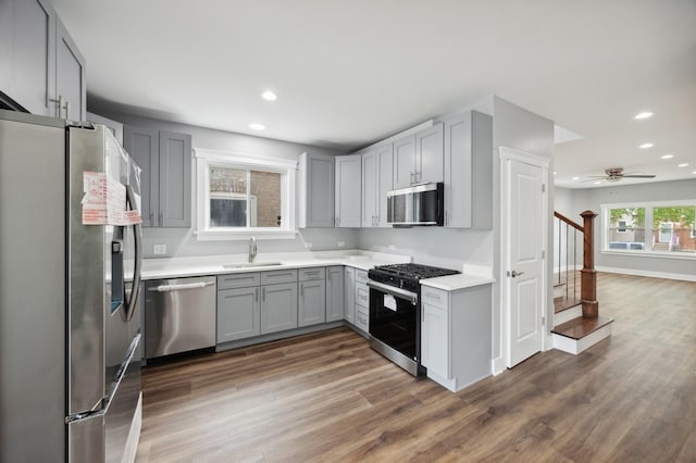3141 Harvey Ave, Berwyn, IL 60402 - kitchen featuring a sink, gray cabinets, appliances with stainless steel finishes, and dark wood finished floors