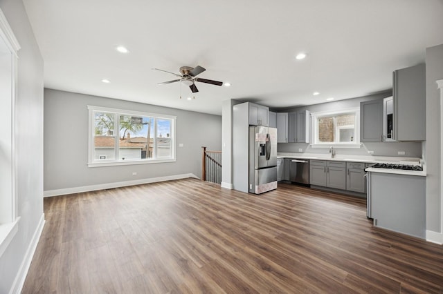 3141 Harvey Ave, Berwyn, IL 60402 - kitchen with a sink, gray cabinets, dark wood-style flooring, and stainless steel appliances