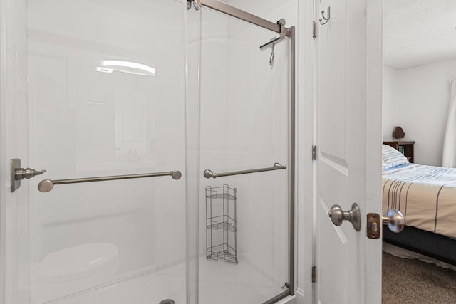 ensuite bathroom with a stall shower and ensuite bath