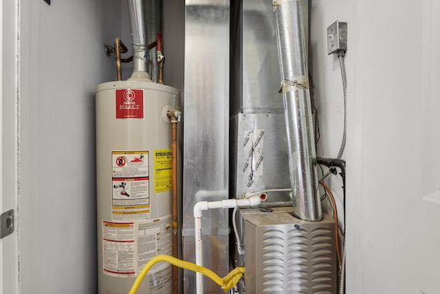 utilities featuring heating unit and gas water heater