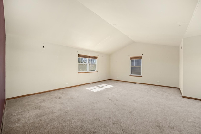 11253 Victoria Ln, Huntley, IL 60142 - bonus room featuring lofted ceiling, light colored carpet, and baseboards