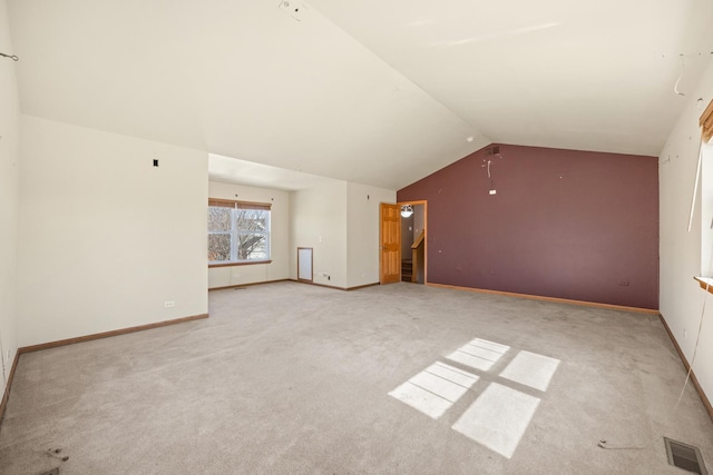 11253 Victoria Ln, Huntley, IL 60142 - additional living space featuring baseboards, visible vents, light colored carpet, and lofted ceiling