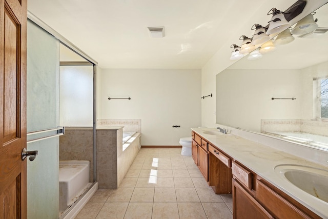 11253 Victoria Ln, Huntley, IL 60142 - full bath with a sink, double vanity, toilet, a bath, and tile patterned floors