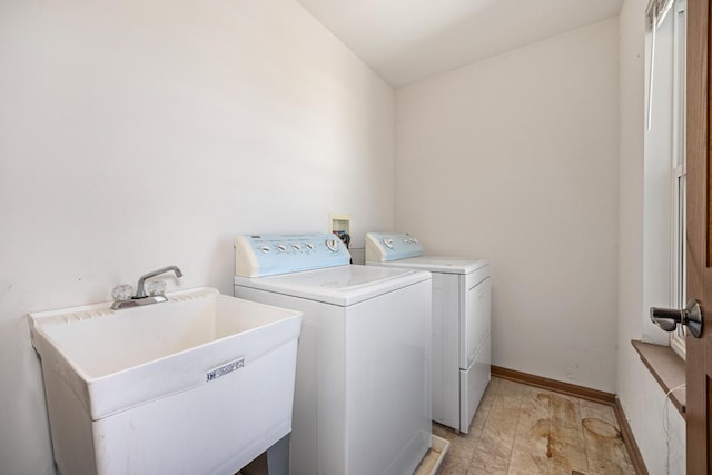 11253 Victoria Ln, Huntley, IL 60142 - laundry area featuring washing machine and dryer, a sink, laundry area, and baseboards